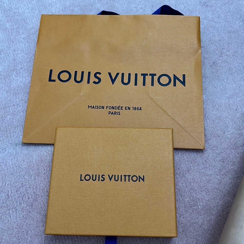 Brand new LV box with dust bag and ribbon. Shopping bag included.